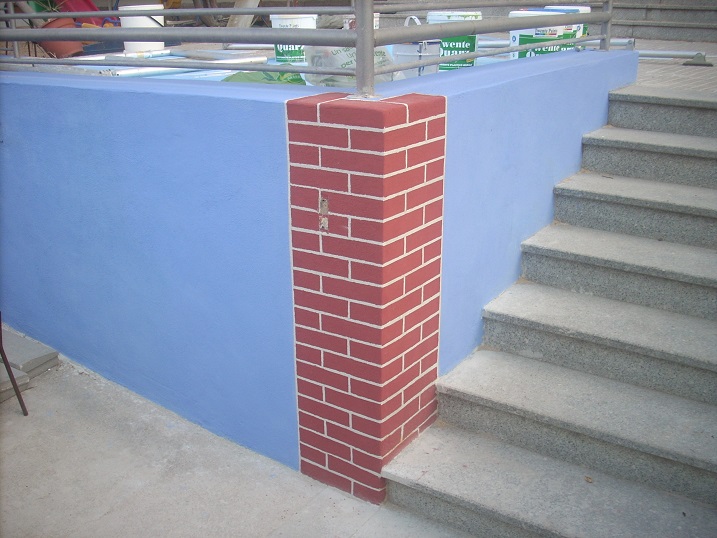 The faux brick pillar